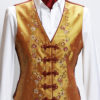 Ladies gold silk waistcoat with floral embroidery and red silk frogging and piping