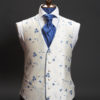Ivory silk waistcoat with blue embroidery and blue piping