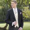 Light weight black herringbone wool morning coat with grey stripe trousers