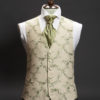 Cream linen waistcoat with green embroidery