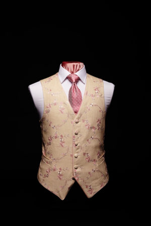 Cream linen embroidered waistcoat with pink embroidery with pink piping