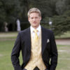 Light weight black herringbone wool morning coat with grey stripe trousers