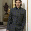 Bespoke Nehru jacket in black watch tartan wool with green velvet collar and pockets