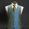 Turquoise blue silk waistcoat with gold embroidery and ivory and blue flowers