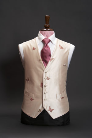 Light pink silk waistcoat with pink butterflies and pink piping