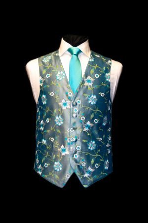 Turquoise blue embroidered silk waistcoat with white and green flowers